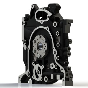 May include: A black engine component with a silver-colored circular center and numerous holes and openings. The component has a complex, geometric design and is set against a white background.