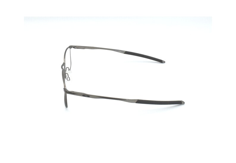 May include: A pair of silver-toned metal spectacles with black temple tips.