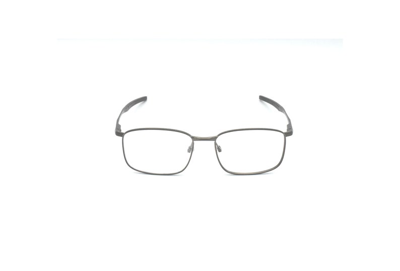May include: A pair of silver-toned metal spectacles with rectangular lenses.