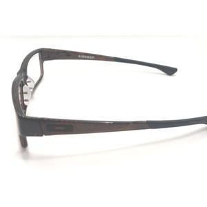 May include: A pair of eyeglasses with a dark brown frame and black temples. The text "AIRDROP" is visible on the frame. The glasses are set against a white background.