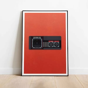 May include: A black and gray Atari 2600 joystick with the text "CONTROL PAD" printed on the top. The joystick has a round directional pad, two buttons, and a red "START" button.