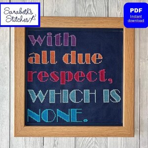 May include: Cross-stitch art in a wooden frame. The navy blue fabric features the phrase "with all due respect, which is none" in colorful cross-stitched letters. The upper left corner has a logo that says "Sarabeth's Stitches".