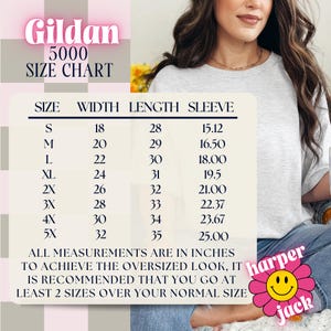 May include: A Gildan 5000 size chart in a light pink banner. The chart lists sizes S to 5X, with corresponding width, length, and sleeve measurements in inches. The text recommends sizing up for an oversized fit. A smiling flower logo is in the bottom right.