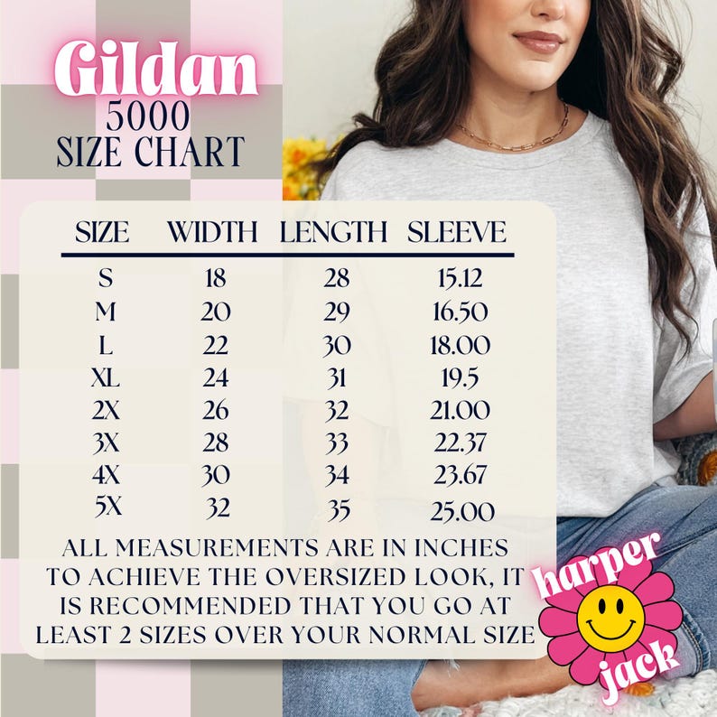 May include: A Gildan 5000 size chart in a light pink banner. The chart lists sizes S to 5X, with corresponding width, length, and sleeve measurements in inches. The text recommends sizing up for an oversized fit. A smiling flower logo is in the bottom right.