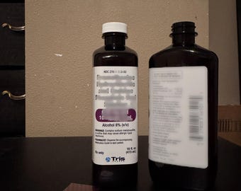 Tris Purple 16oz Pint Bottle Replica – Movie Prop Display Item (Empty)