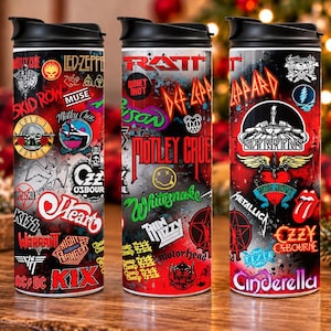 May include: Three cylindrical tumblers with black lids, each featuring a collage of various rock band logos and graphics including Led Zeppelin, Guns N' Roses, Motley Crue, Kiss, AC/DC, Ratt, Def Leppard, Scorpions, Metallica, and Cinderella.