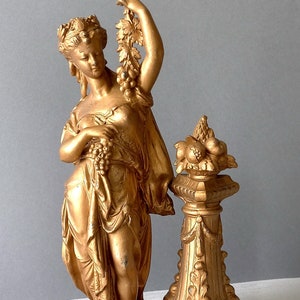 Large antique female figurine in neoclassical style, classical Greek style statue, Roman style ornamental statuette