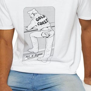 Gold Coast, Chicago. Vintage Gay Graphic T-shirt, Etienne, Tom of Finland style by AllGay 100% queer owned and operated
