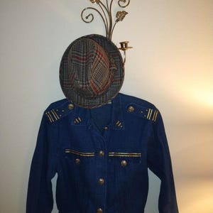80s Rio inter......glam jean jacket with mega gold detailing, fits small to med, excellent piece!!