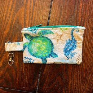 Cartera con llavero de pulsera