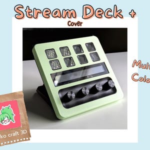May include: A mint green Stream Deck cover with a black base, featuring multiple buttons and dials. The cover has a screen and is labeled "Stream Deck + Cover". The image also includes the text "Multiple Colors!"