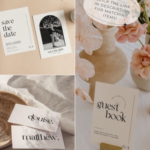 May include: A set of wedding stationery with a minimalist design. The save the date cards feature a black and white photo of a couple under an archway. The guest book sign has a simple black and white design with the text "guest book".