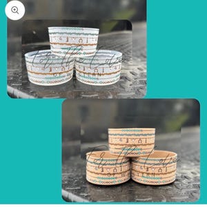 May include: Four beige drink sleeves with a Western-themed design. The sleeves feature a repeating pattern of horseshoes, cacti, and other Western motifs, with the text "The Heart of Western" printed on them.