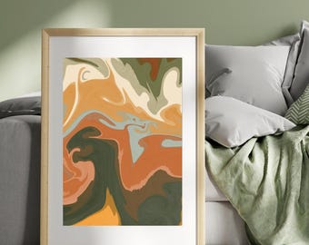 May include: Abstract art print with swirling patterns in shades of orange, brown, green, and white. The print is framed in a light wood frame.