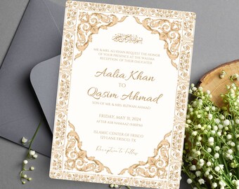 May include: A white wedding invitation with gold ornate borders and text. The invitation is for Aalia Khan and Qasim Ahmad. The wedding will take place on Friday, 31 May 2024 at 5:00 PM at the Islamic Centre of Frisco, 123 Lane Frisco, TX. Reception to follow.