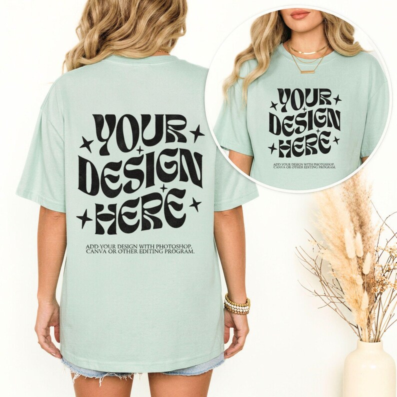 May include: A light green t-shirt with the text "YOUR DESIGN HERE" in black, with star accents. The back of the shirt also features the same text. The bottom of the shirt reads "ADD YOUR DESIGN WITH PHOTOSHOP, CANVA OR OTHER EDITING PROGRAM."