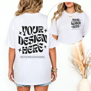 May include: White t-shirt with the text "YOUR DESIGN HERE" in black, with star accents. The back of the shirt features the same design, with additional text: "ADD YOUR DESIGN WITH PHOTOSHOP, CANVA OR OTHER EDITING PROGRAM."