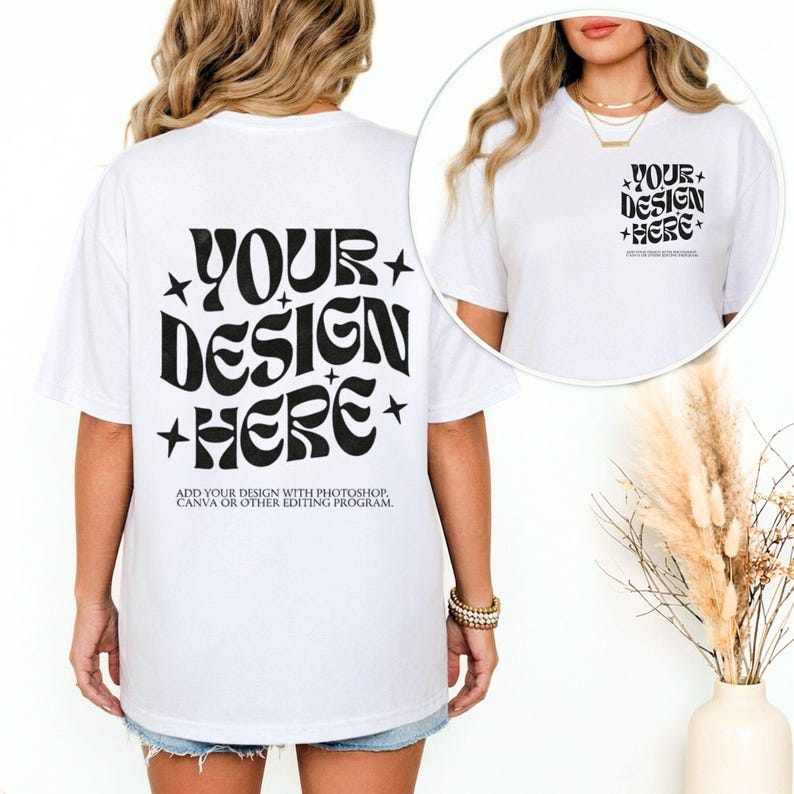 May include: White t-shirt with the text "YOUR DESIGN HERE" in black, with star accents. The back of the shirt features the same design, with additional text: "ADD YOUR DESIGN WITH PHOTOSHOP, CANVA OR OTHER EDITING PROGRAM."