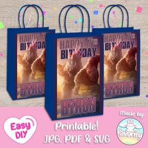 May include: Three blue gift bags with a Godzilla and Kong image. The bags have the text "Happy 7th Birthday" and the name "Byron" printed on them.