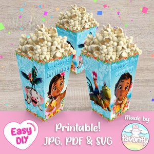 May include: Printable Moana themed popcorn boxes with blue, green, and white designs. The boxes feature Moana, Maui, and Pua. The text on the boxes reads "Moana's Birthday" and "Thanks for coming".