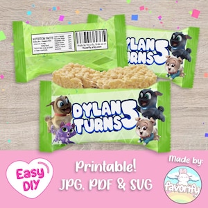 Puede incluir: Diseño de bolsa de regalo imprimible con los personajes de la Patrulla Canina Chase y Marshall. La bolsa es verde con un borde blanco y dice "Dylan cumple 5 años".