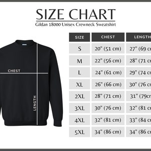 May include: Size chart for a Gildan 18000 Unisex Crewneck Sweatshirt. The chart shows sizes S through 5XL with corresponding chest and length measurements in inches and centimeters.
