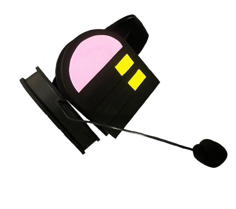 May include: Black headset with a pink and yellow design. The headset has a microphone attached to the earpiece.