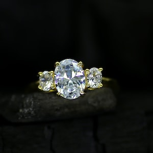 Fake 3 stone engagement rings best sale