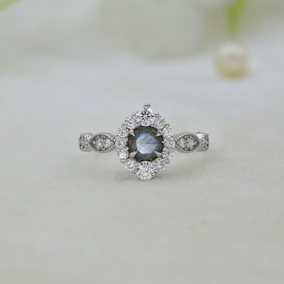 Cheryl M Sterling Silver Simulated Paraiba Tourmaline and CZ Halo Post Earrings Cheryl M Sterling Silver Simulated Paraiba Tourmaline and CZ Halo Post Earrings