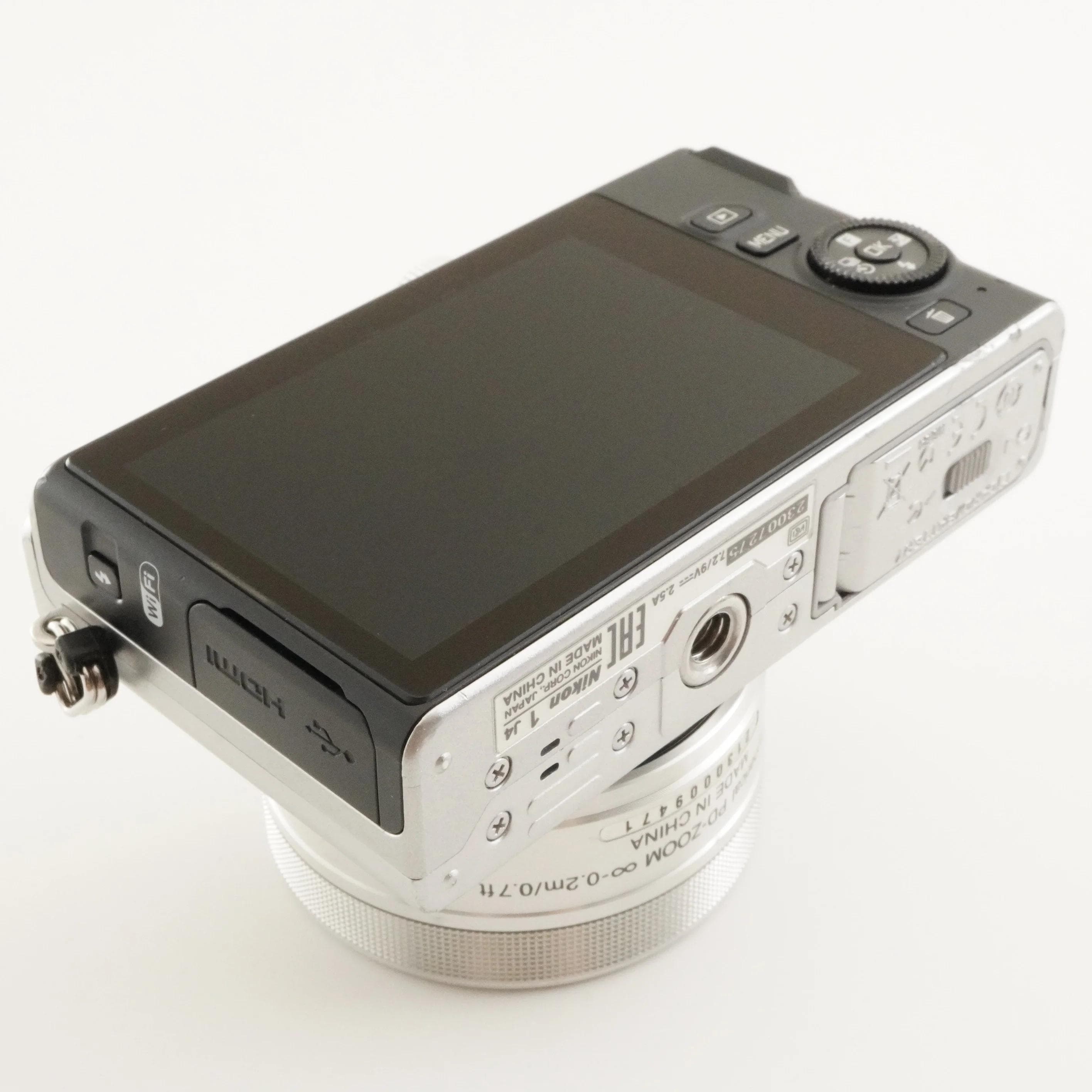 Nikon 1 J4 Silver [3,599 Shots] + 1 NIKKOR 10-30mm + 4GB Microsd