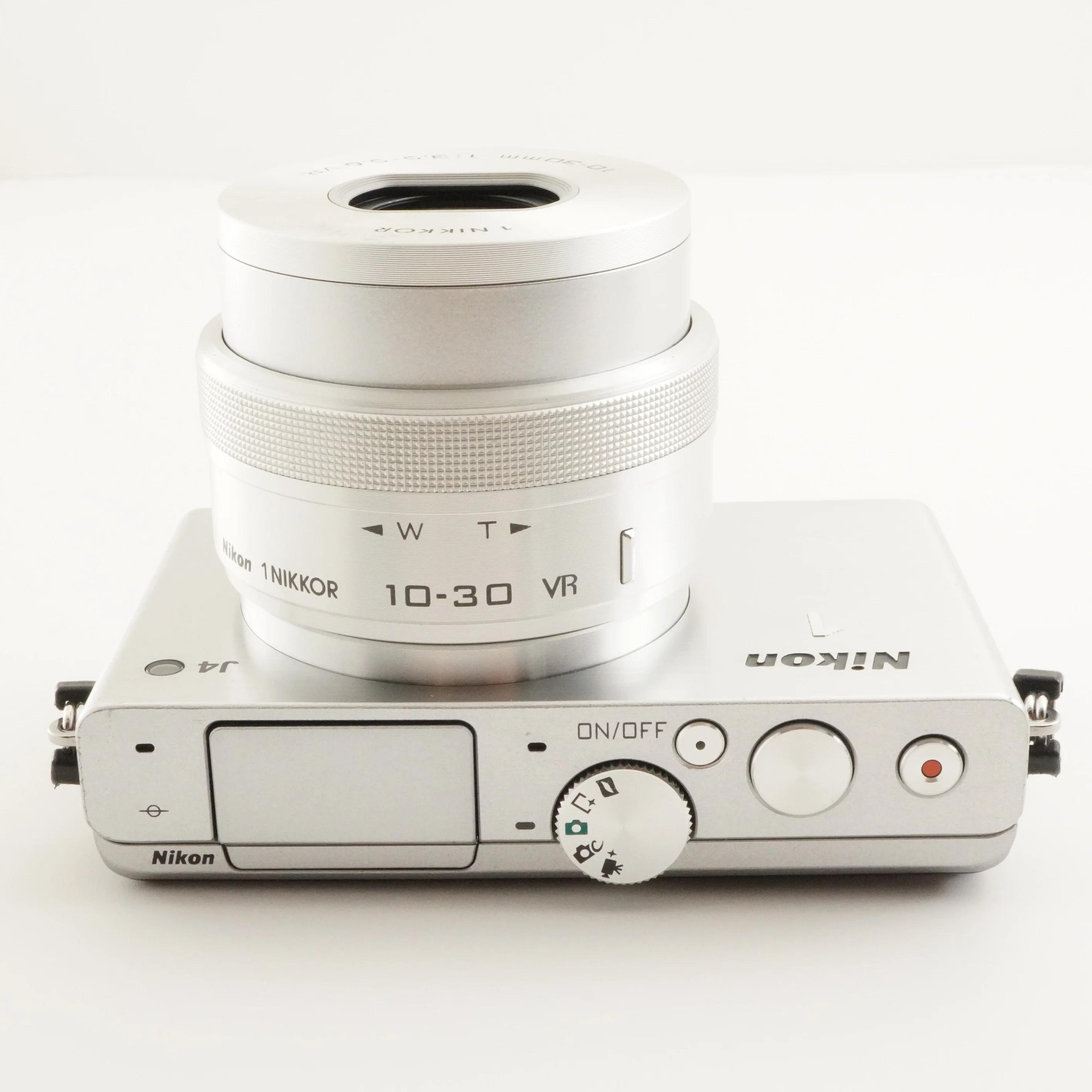 Nikon 1 J4 Silver [3,599 Shots] + 1 NIKKOR 10-30mm + 4GB Microsd
