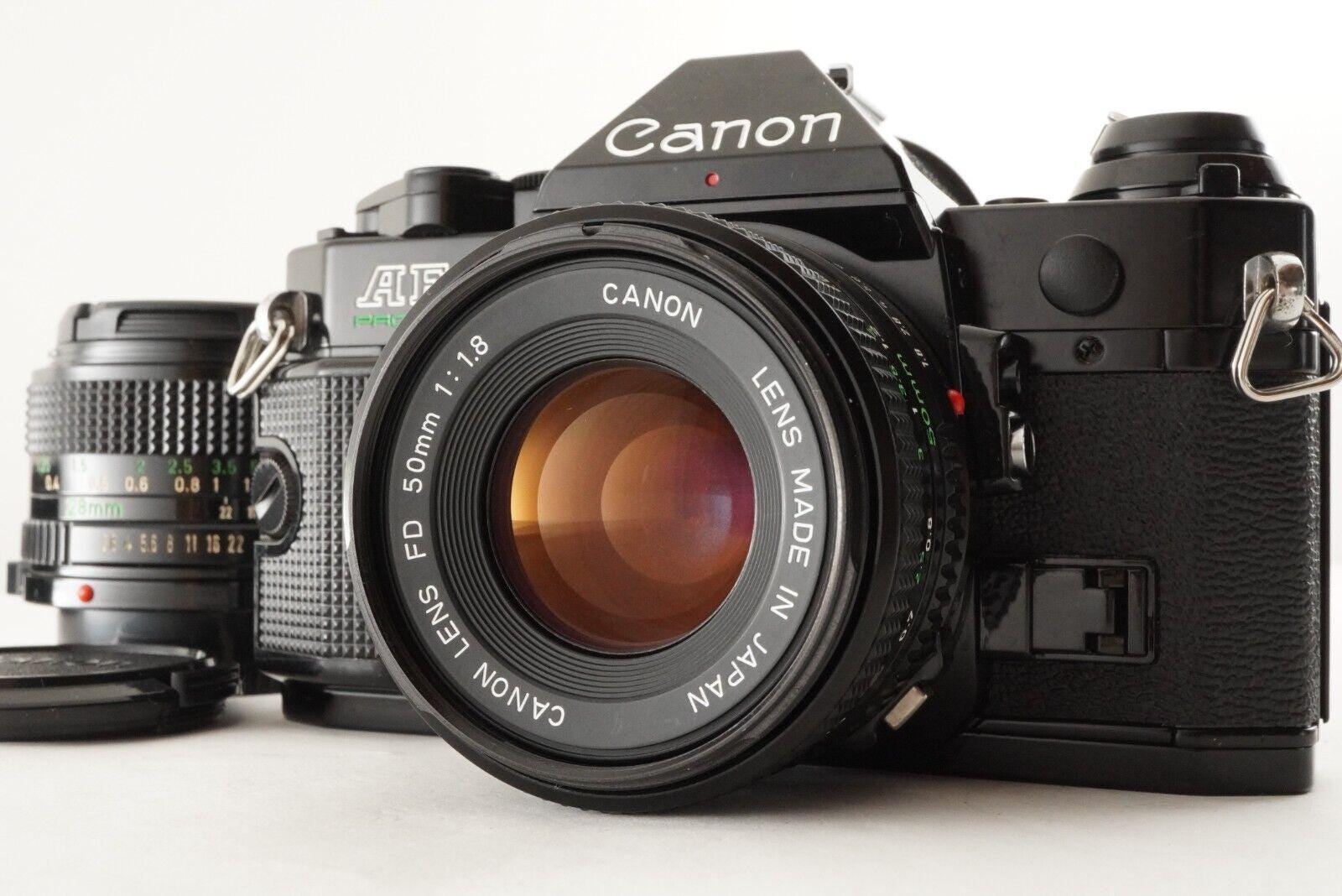 Canon AE-1 PROGRAM ブラック + FD 50mm F2 Exc] Video Canon AE-1 Program Black Film Camera New FD 50mm