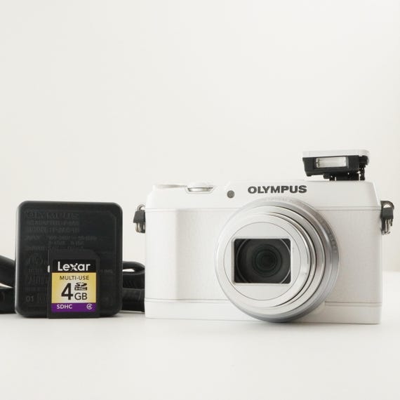 OLYMPUS STYLUS SH-1 White With 4gb Sdhc Card Digital Camera OLYMPUS STYLUS SH-1 White With 4gb Sdhc Card Digital Camera