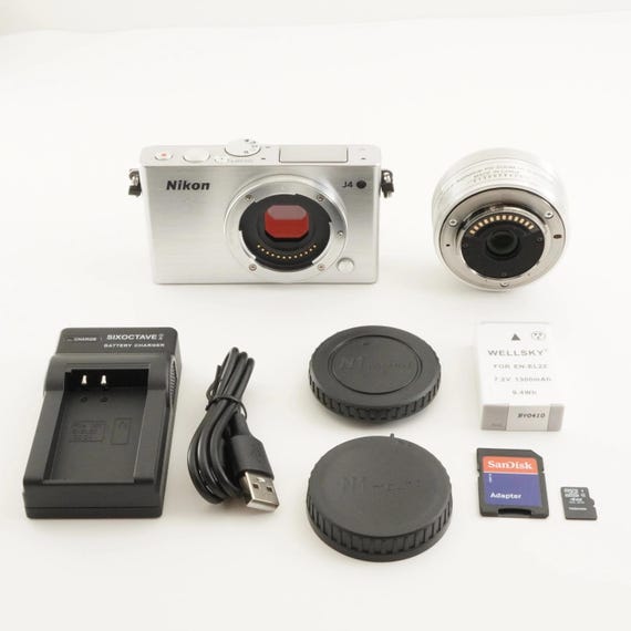 Nikon 1 J4 Silver [3,599 Shots] + 1 NIKKOR 10-30mm 4GB Microsd