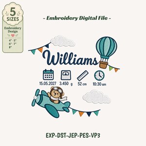 May include: An embroidery digital file design featuring the name Williams, a teal hot air balloon, a teddy bear pilot in a teal airplane, clouds, and bunting. Includes icons for a calendar, scale, ruler, and clock with text 15.05.2027, 3.450 g, 52 cm, 10:30 am.