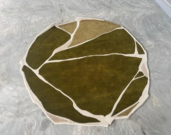 Hand tufted geometric rug