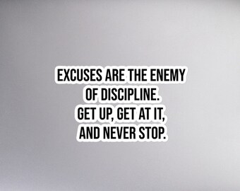 May include: A white laptop with a black sticker that reads "EXCUSES ARE THE ENEMY OF DISCIPLINE. GET UP, GET AT IT, AND NEVER STOP."