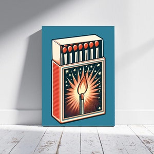 Puede incluir: Una impresión en lienzo rectangular que presenta una ilustración estilizada de una caja de cerillas. La caja de cerillas es roja, crema y verde azulado, con una cerilla encendida en el centro. El fondo es verde azulado, y la impresión se muestra en una pared y un suelo blancos.