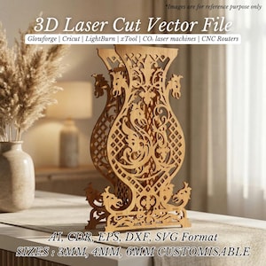 May include: A wooden laser-cut vector file of a decorative vase. The vase has an intricate openwork design with floral and dragon motifs. The text on the image reads "3D Laser Cut Vector File" and lists compatible laser cutting machines and file formats. The sizes are 3mm, 4mm, and 6mm.