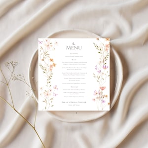 May include: A floral-themed menu for a bridal shower. The menu features a starter, main course, dessert, and the text "SARAH'S BRIDAL SHOWER June 3rd 2024".