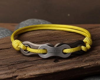 Braccialetto ecologico giallo – Fatto a mano con catene di bicicletta riciclate e paracord