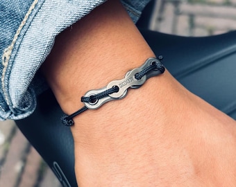 Braccialetto con catena per bicicletta riciclata nera: Paracord ecologico - Fatto a mano nei Paesi Bassi