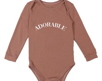 Lubalé | Adorable body organic cotton from Portugal in pastel tones: olive, mocha, beige, and white