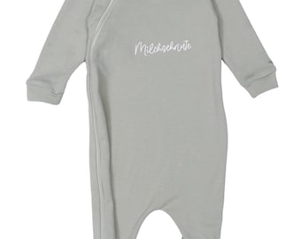 Lubalé | Michschnute organic cotton romper with zipper from Portugal in pastel tones: olive, mocha, beige, and white