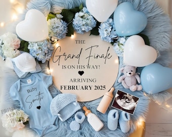 May include: A baby announcement with a light blue onesie, a knitted hat, booties, and a sign that reads "The Grand Finale is on his way! Arriving February 2025." Heart-shaped balloons and a teddy bear are also included.