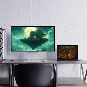 May include: A computer setup featuring a large monitor displaying a fantasy landscape with a floating island and a laptop showing a library interior. The scene is set on a gray desk with a black chair.