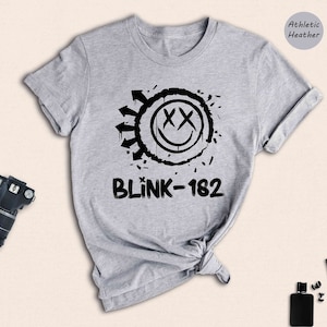 a t - shirt with the words blink - 1932 printed on it