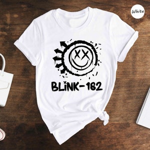 a white shirt with a black and white logo on it
