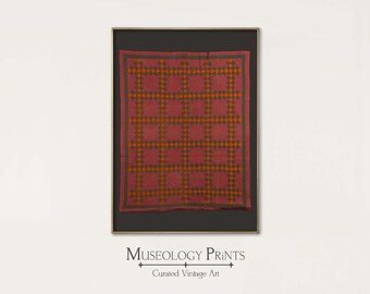 May include: A framed vintage quilt with a red background and a geometric pattern of orange and green squares. The quilt is framed in a black frame with a gold border. The text "MUSEOLOGY PRINTS" is printed below the frame.