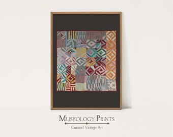 May include: A framed print of a vintage quilt with a geometric pattern in shades of red, blue, green, yellow, and gray. The quilt is made of various fabrics and has a patchwork design. The print is titled "Museology Prints: Curated Vintage Art".